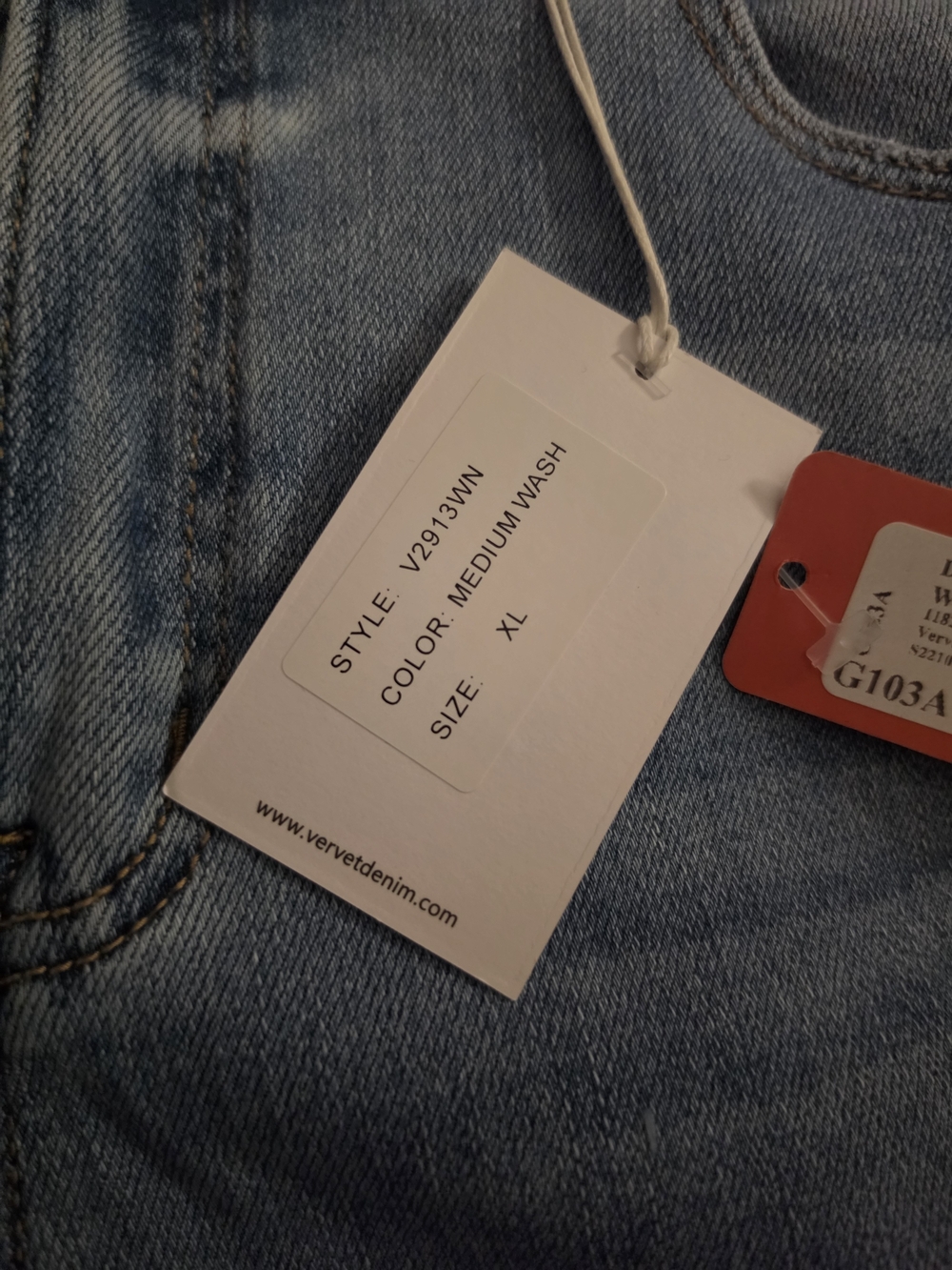 Women’s Light Blue Distressed Denim Roll-Cuff Shorts - Picture 2 of 5